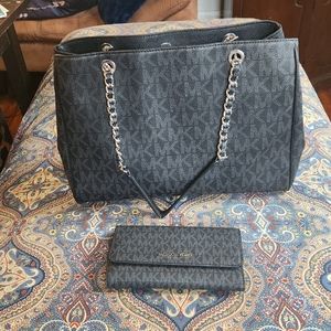 Black and gray Michael Kors purse